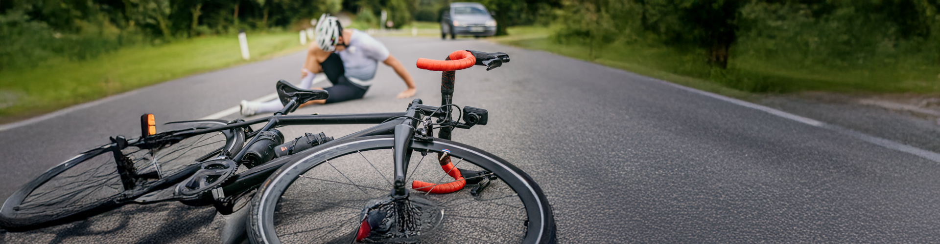 man in bicycle accident with car